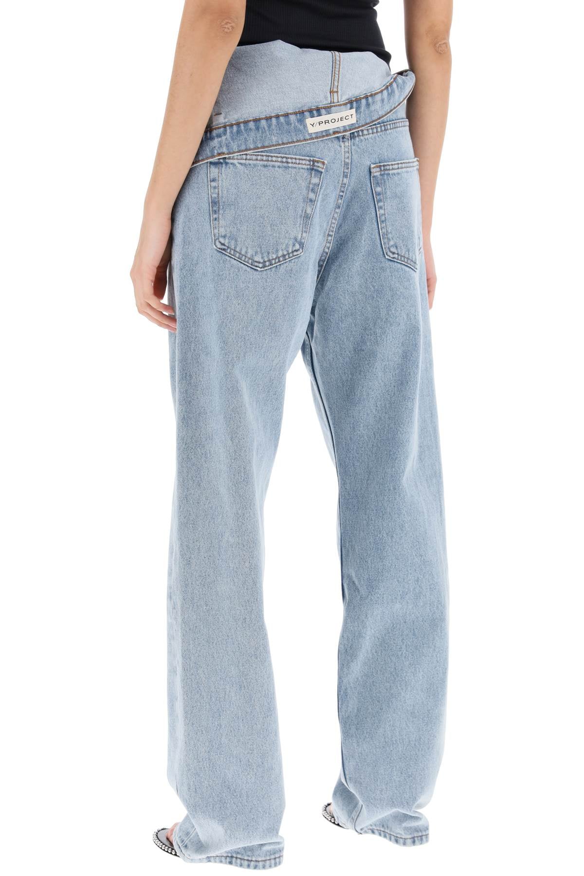 Y PROJECT asymmetric waist jeans with seven