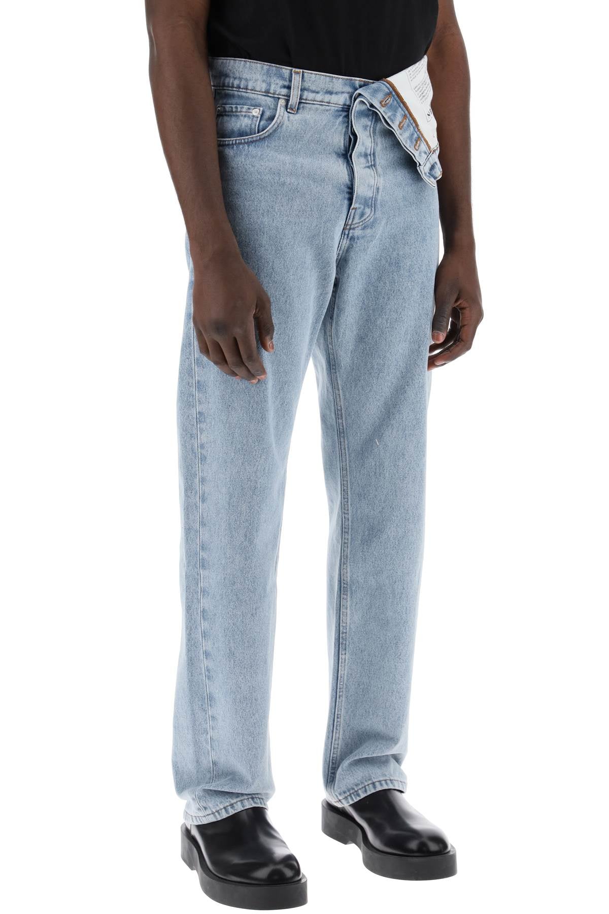 Y PROJECT asymmetric waist jeans with seven