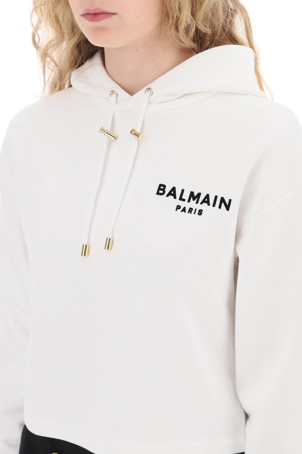 BALMAIN cropped hoodie with flocked logo