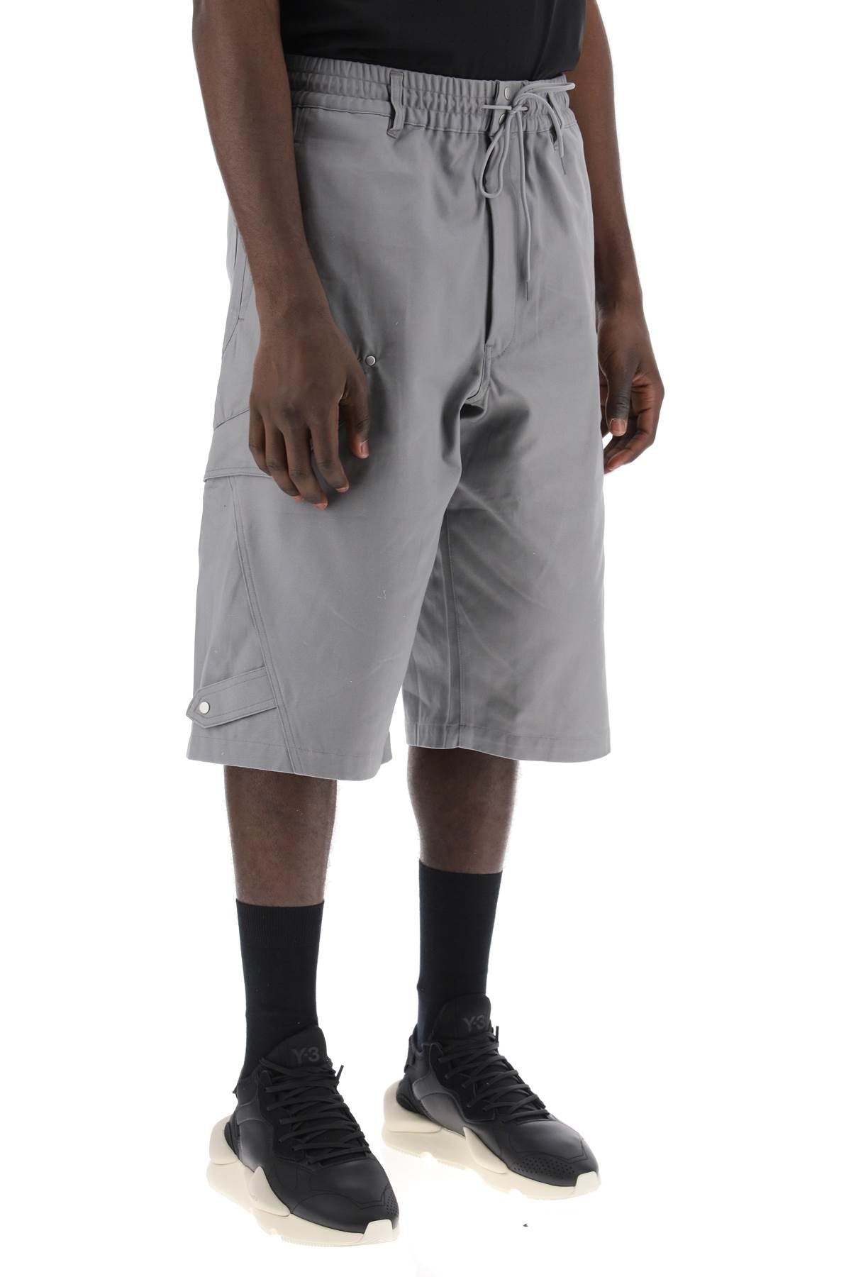 Y-3 canvas multi-pocket bermuda shorts.