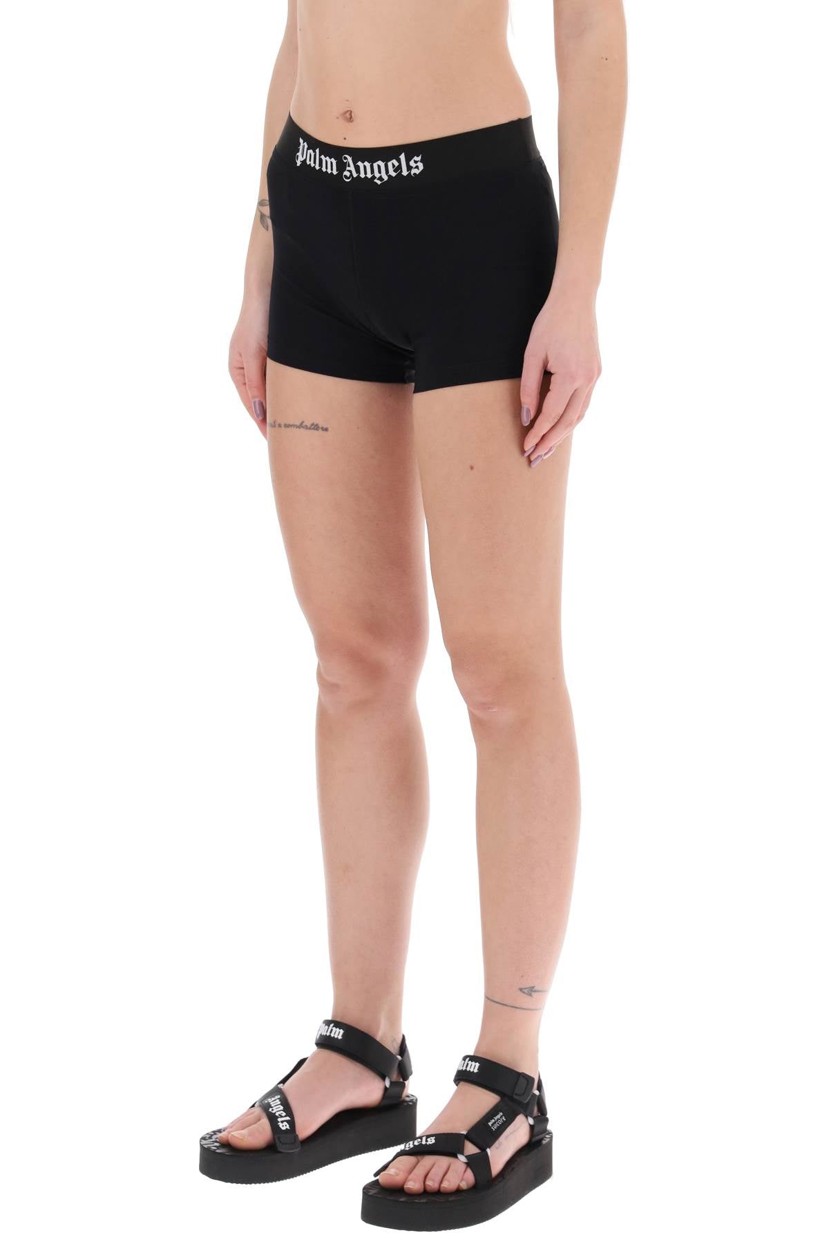 PALM ANGELS sporty shorts with branded stripe